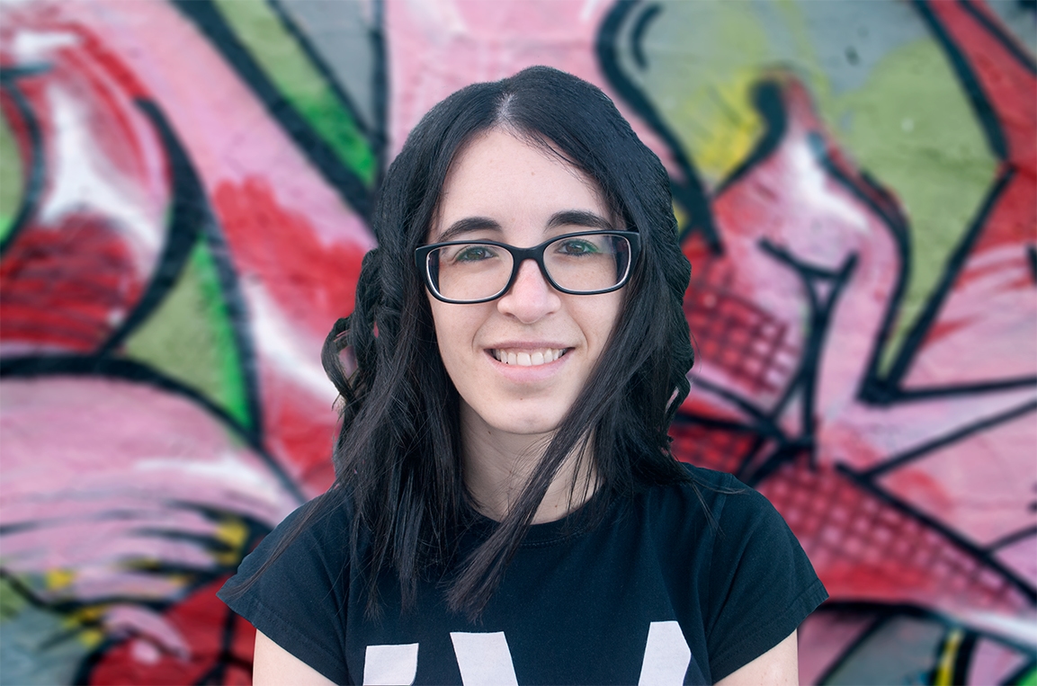 Me with a graffiti wall in the background